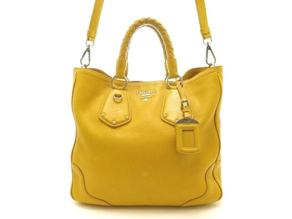 Prada Vitello Daino pebble leather braided bag Mimosa Yellow